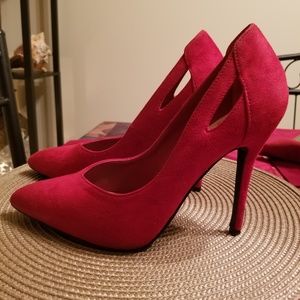 Red pointed toe pumps